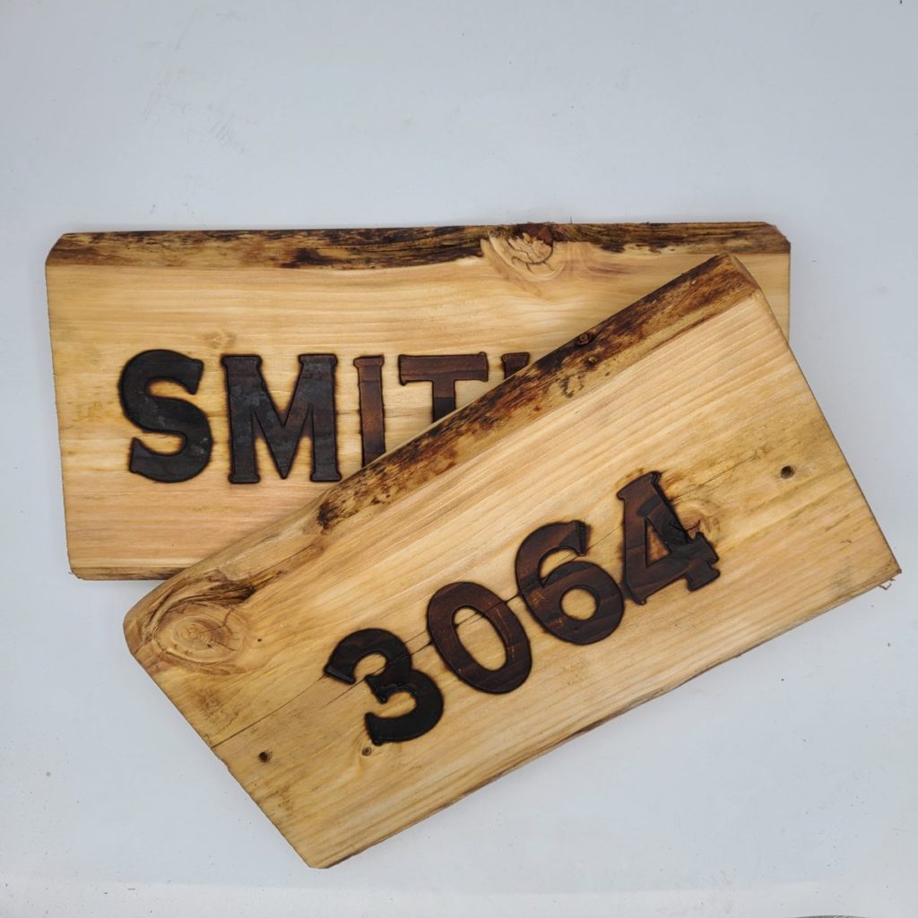 CUSTOM Live offers edge wood burned and hand painted name plaque